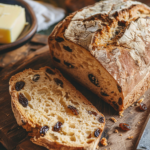 Blue Ribbon Irish Soda Bread sliced on a wooden board